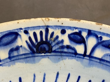 A blue and wite Iznik dish with floral design, Turkey, late 16th C.